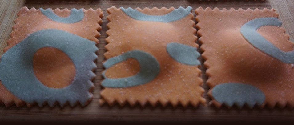 Elaborate ravioli in orange and blue