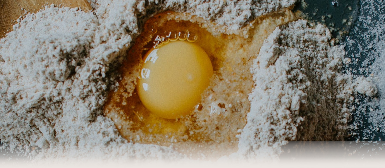 An egg in flour